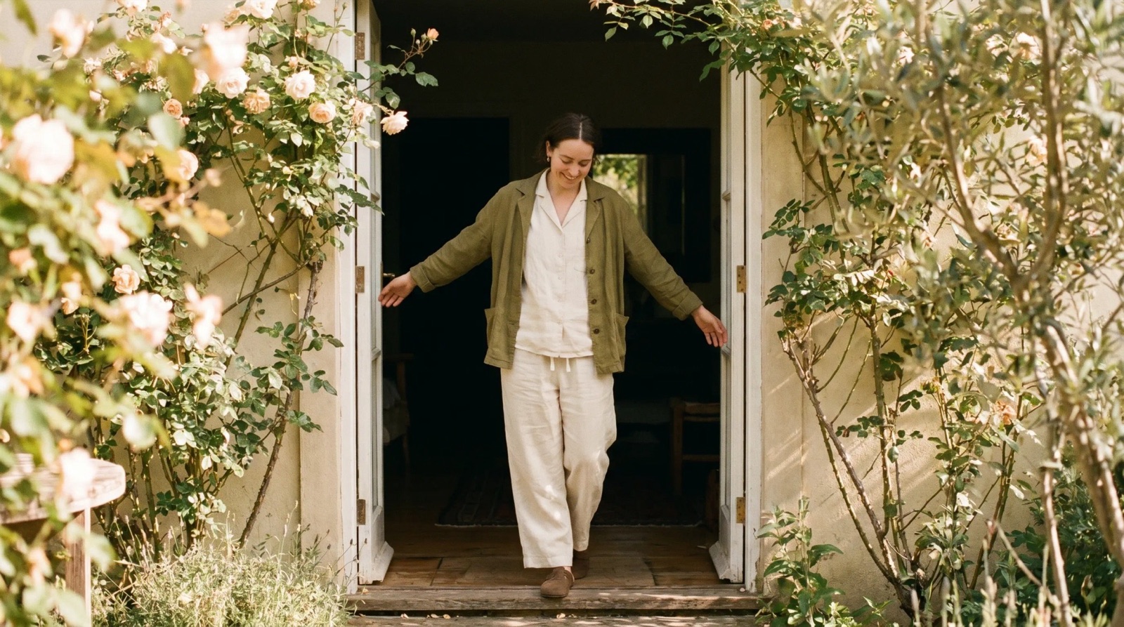 A garden doorway in soft morning light, standing open